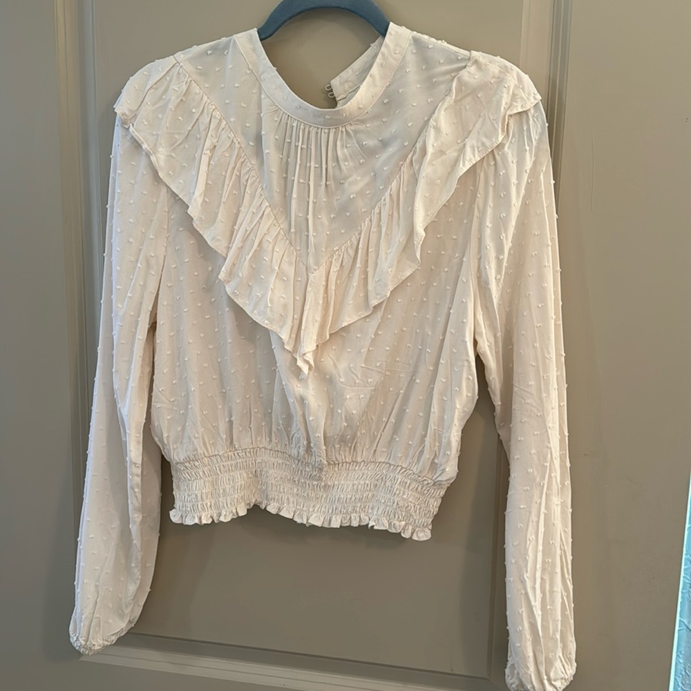 Cream top. Cinched bottom. Never worn